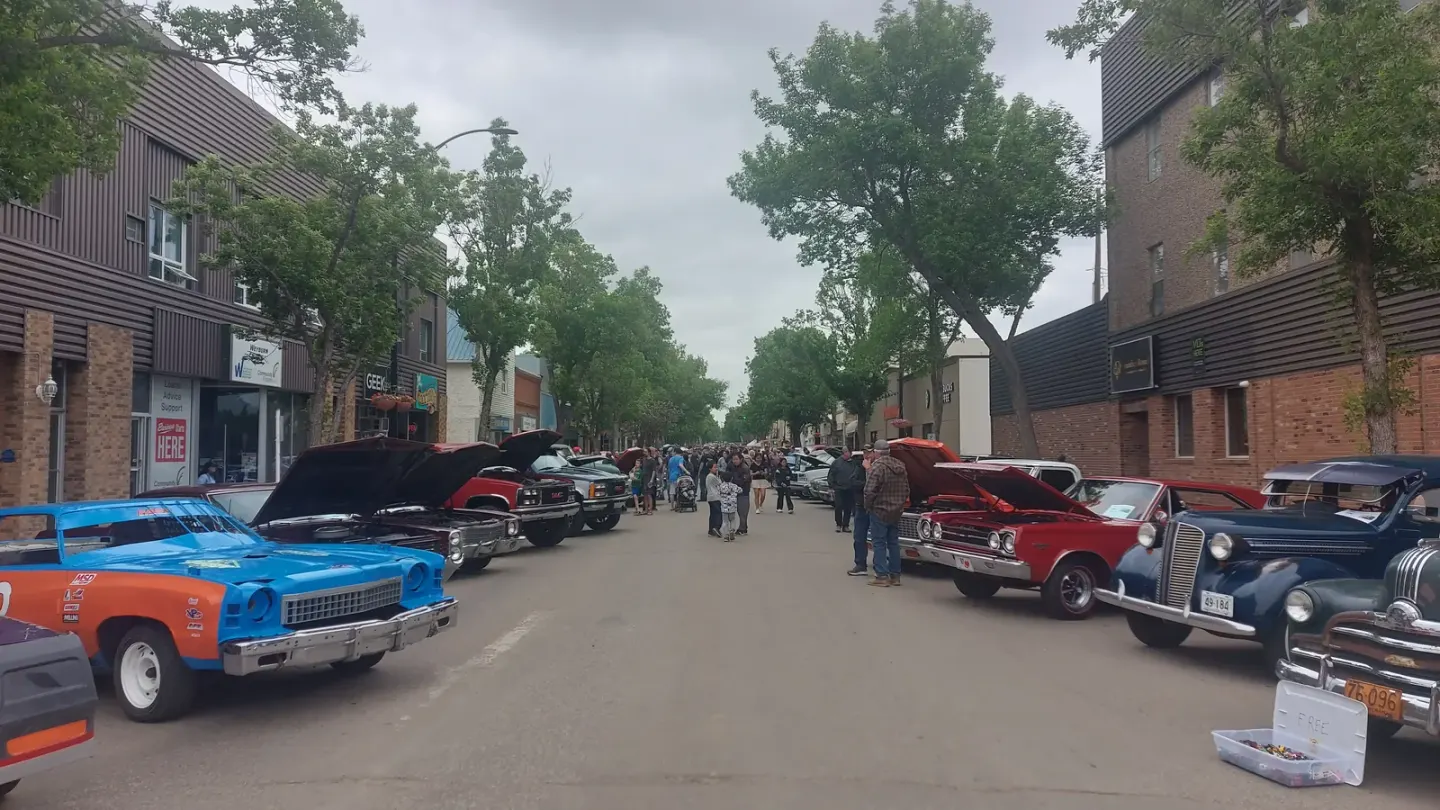 Real Pest Control exterminator on route through downtown Weyburn, Saskatchewan
